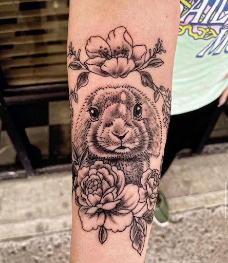 Explore looney tunes tattoo ideas, creative tattoo ideas in Aurora, available at Primal Tattoo and Piercing