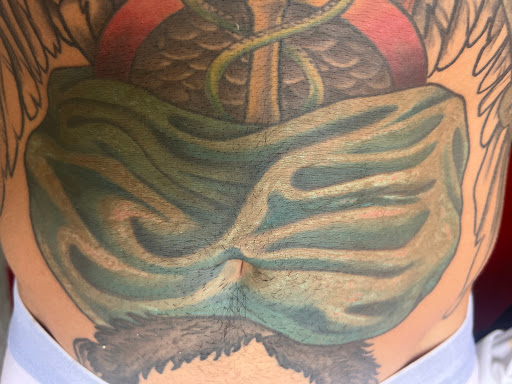 Explore butterfly cover up tattoo ideas, creative tattoo ideas in Ocala, available at The Tattoo Gallery of Ocala LLC