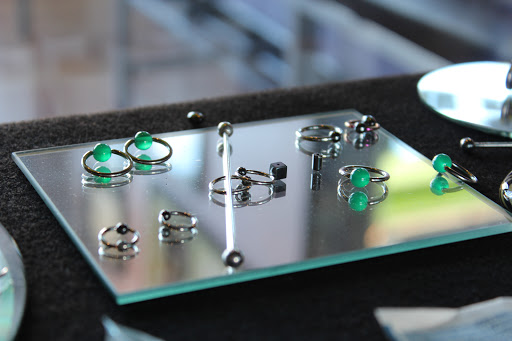 Explore harley davidson sleeve tattoo ideas, creative tattoo ideas in Miami, available at Green Machine Tattoos & Body Piercing