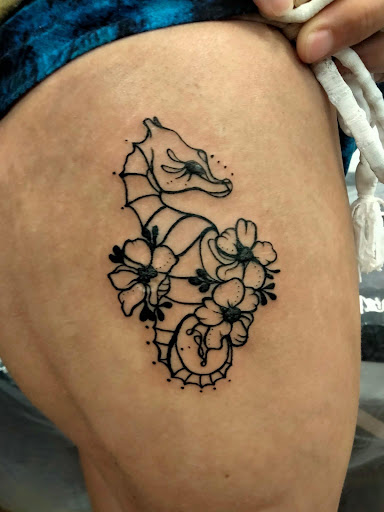 Explore woman shoulder tattoo ideas, creative tattoo ideas in Lake City, available at Crooked Spines Tattoo Studio
