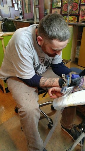 Tattoo Shop «White Tiger Tattoo», reviews and photos, 466 W Ridge Rd, Rochester, NY 14615, USA
