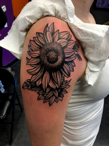 Explore leo tattoo ideas male, creative tattoo ideas in Westland, available at Skin Sinn tattoos