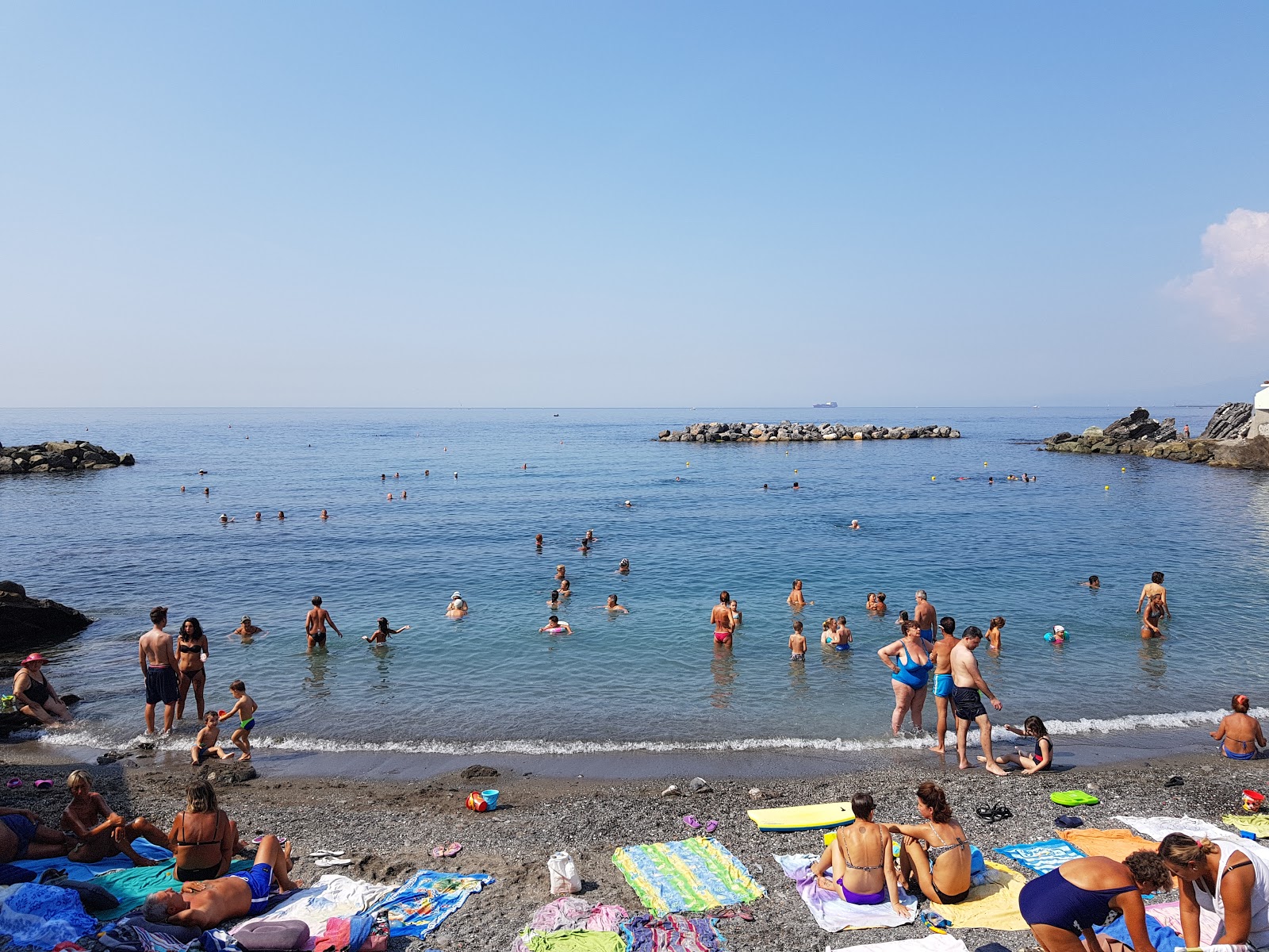 Foto van Spiaggia San Rocco met kleine baai