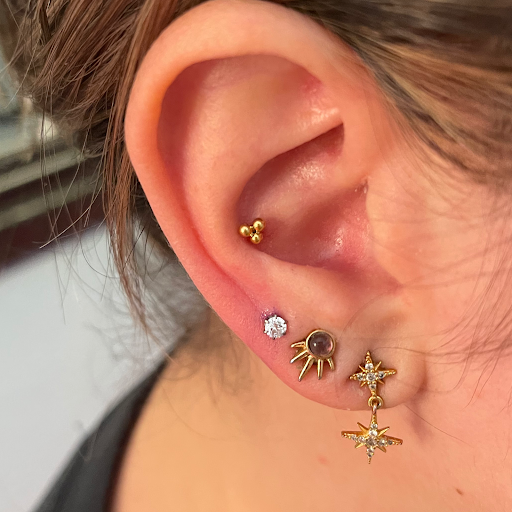 Explore throuple tattoo ideas, creative tattoo ideas in Palm Harbor, available at Angry Owl Tattoo and Piercing