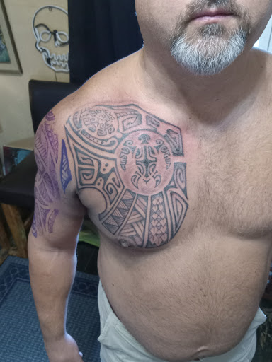 Explore checkered flag tattoo ideas, creative tattoo ideas in Roanoke, available at RailYard INK