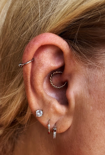 Explore tattoos for your son ideas, creative tattoo ideas in Greensboro, available at Fern Piercing and Fine Jewelry