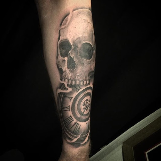 Find in between boob tattoo ideas for your next unique tattoo in Anaheim at Torch Tattoo