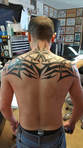 Explore tattoo ideas for a foot, creative tattoo ideas in Elko, available at Tom Custom Tattoos and Body Piercing Studio