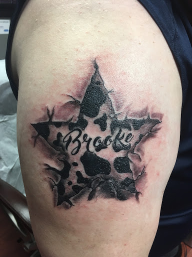 Explore upper back tattoo cover up ideas, creative tattoo ideas in Coldwater, available at Relevant Tattoo and Piercing
