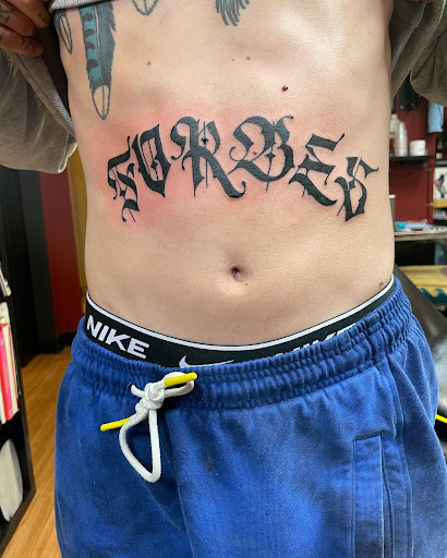 Explore tattoo of son's name ideas, creative tattoo ideas in Saint Paul, available at Capital Tattoo