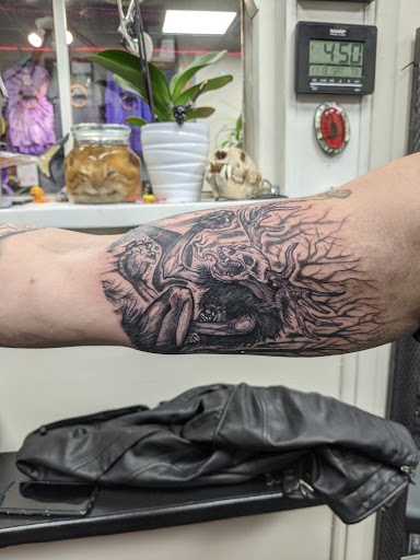 Explore family tattoo ideas for guys, creative tattoo ideas in Slippery Rock, available at Dinky Dachshund Tattoo Parlor