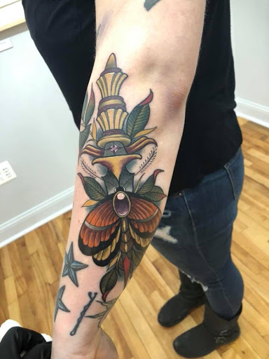 Explore karma tattoo ideas for men, creative tattoo ideas in Kansas City, available at Golden Stag Tattoo and Gallery