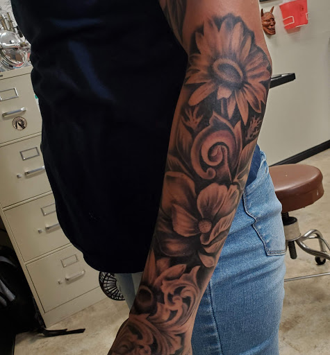 Explore ladies hand tattoo ideas, creative tattoo ideas in Bakersfield, available at CLASSIC STANDARD TATTOO CO.