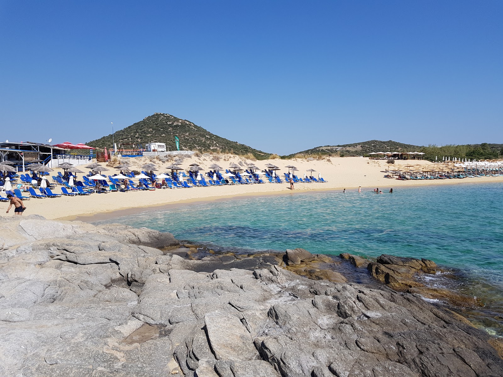 Foto von Ammolofoi Strand und die siedlung