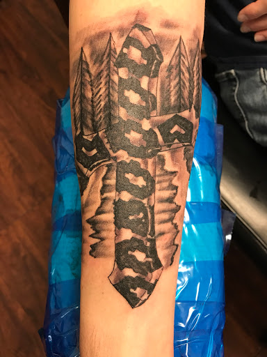 Explore face tattoos ideas, creative tattoo ideas in Seymour, available at American Gypsy Tattoo Corp.