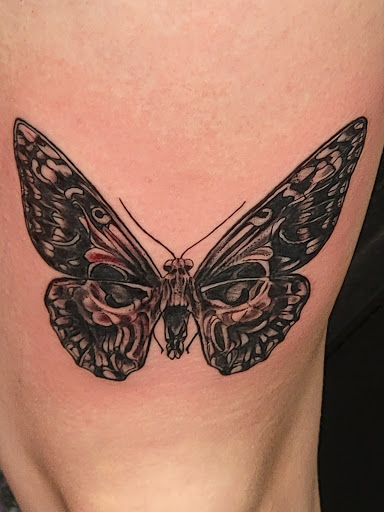 Explore cover up tattoo ideas female leg, creative tattoo ideas in Sarasota, available at Z-Edge Tattoo and Body Piercing North Shop