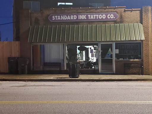 Explore spine tattoo ideas male, creative tattoo ideas in Chattanooga, available at Standard Ink Tattoo Co