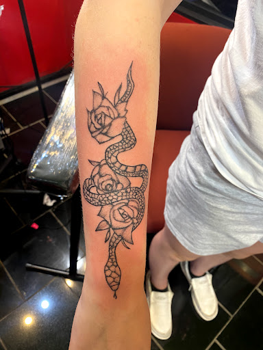 Explore cupid tattoo ideas, creative tattoo ideas in Lexington, available at LexInk Tattoo