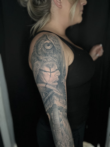 Explore wrap around tattoo ideas, creative tattoo ideas in Cadillac, available at Limitless Ink Tattoo Studio