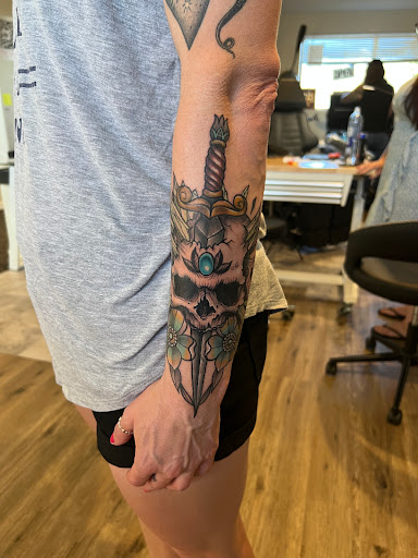 Explore chandelier tattoo ideas, creative tattoo ideas in Elko, available at Freedom Tattoo