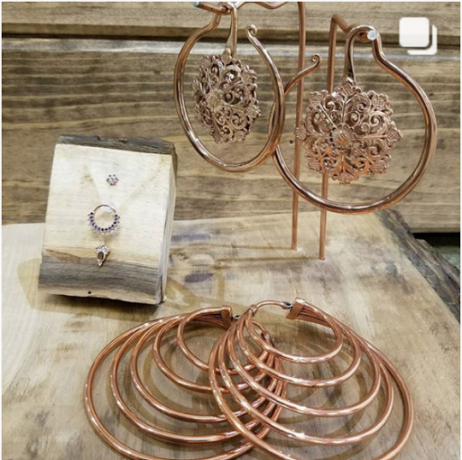 Explore paw tattoo ideas, creative tattoo ideas in Vancouver, available at The Powers That Be Body Piercing