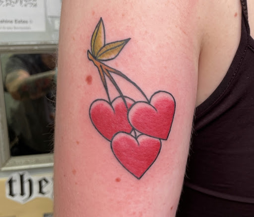 Explore tattoo filler ideas for a woman, creative tattoo ideas in Baltimore, available at Rippd Canvas Tattoo Shop Artists Social Club