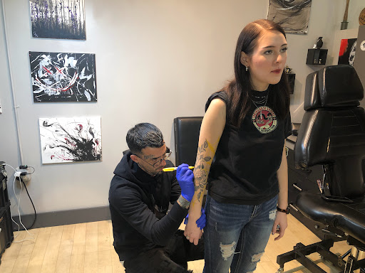 Explore mother of twins tattoo ideas, creative tattoo ideas in Fort Wayne, available at Grade A Tattoos and Body Piercing