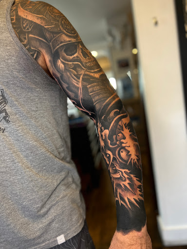 Explore koi sleeve tattoo ideas, creative tattoo ideas in San Diego, available at Guru Tattoo