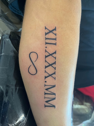 Find traveling tattoo ideas for your next unique tattoo in Rogers at Ink Solutions Tattoo