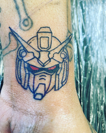 Explore sexy tattoo ideas for men, creative tattoo ideas in Memphis, available at Inkatsuki Tattoos Art Studio