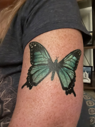 Explore red ink tattoo ideas, creative tattoo ideas in San Diego, available at Family Business Tattoo San Diego