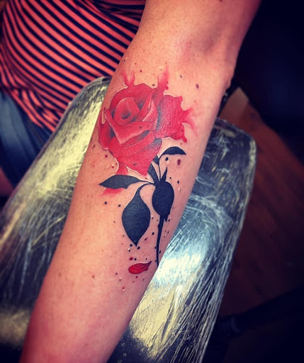 Explore bookworm tattoo ideas, creative tattoo ideas in Williamsport, available at Moa Tattoos