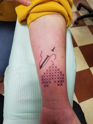 Explore hairline tattoo ideas male, creative tattoo ideas in Erie, available at Wayward Tattoo Studio