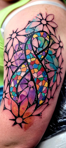 Explore haunted mansion tattoo ideas, creative tattoo ideas in Benton, available at Spectrum Tattoo