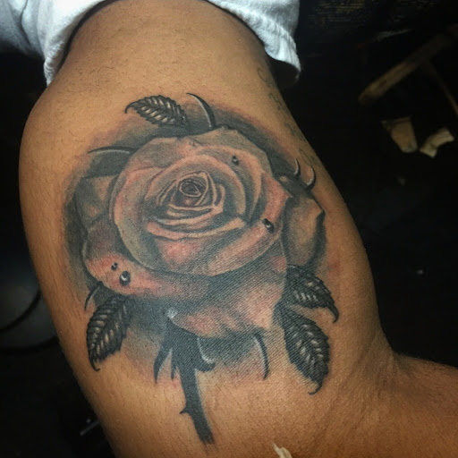 Explore tiger tattoo ideas for men, creative tattoo ideas in Atlanta, available at Camp Creek Body Art & Laser