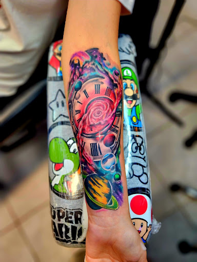 Explore ankle tattoo ideas for men, creative tattoo ideas in Daytona Beach, available at Studio 21 Tattoo & Piercings Daytona Beach