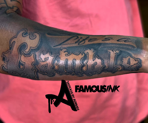 Explore checkered flag tattoo ideas, creative tattoo ideas in Hammond, available at Famous Ink, Inc.