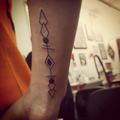 Explore family flower tattoo ideas, creative tattoo ideas in Redding, available at Caddy Daddys