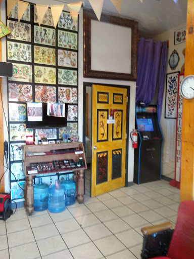 Explore tattoo ideas for young men, creative tattoo ideas in Biloxi, available at Carnivale Tattoo