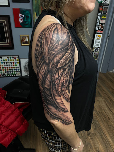 Explore forest sleeve tattoo ideas, creative tattoo ideas in Scranton, available at The Rock Shop Tattoo Gallery