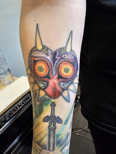 Explore moon tattoo ideas for guys, creative tattoo ideas in Palm Harbor, available at Angry Owl Tattoo and Piercing