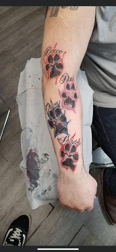 Explore kiss tattoo ideas, creative tattoo ideas in Mishawaka, available at Body Art Gallery