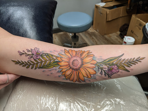 Explore song tattoo ideas, creative tattoo ideas in Tewksbury, available at Lucid Arts Tattoo Studio