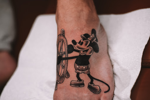 Explore watercolor tattoo ideas for females, creative tattoo ideas in Corona, available at Crop Circles Tattoo Studio