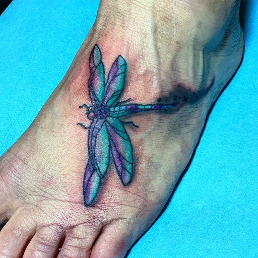 Explore cool guitar tattoo ideas, creative tattoo ideas in Jonesboro, available at Gallery Of Ink Tattoo Shop