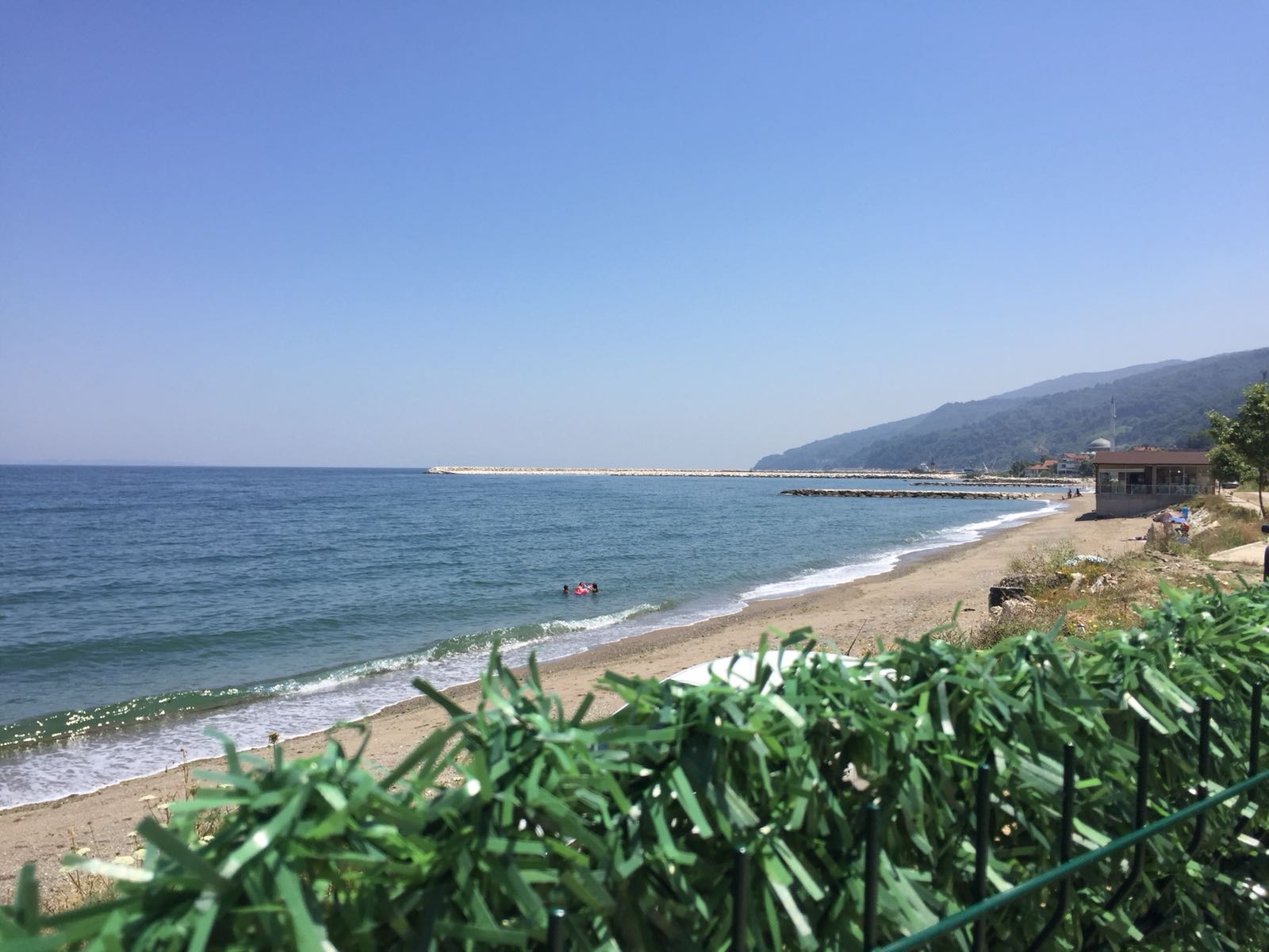 Foto di Kursunlu beach II con una superficie del sabbia grigia e ciottoli