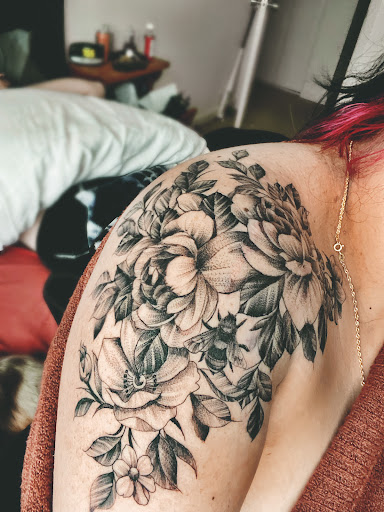 Explore cute thigh tattoo ideas, creative tattoo ideas in Rochester, available at The Ink Cartel Tattoo
