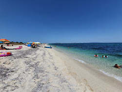 Spiaggia di Stagno di Pilo'in fotoğrafı düz ve uzun ile birlikte