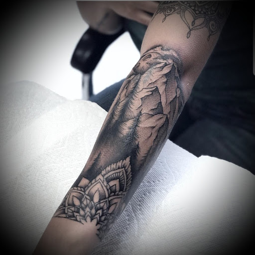 Explore great forearm tattoo ideas, creative tattoo ideas in Millsboro, available at Tattoo Galaxy (Millsboro) Piercing & Custom tattoos