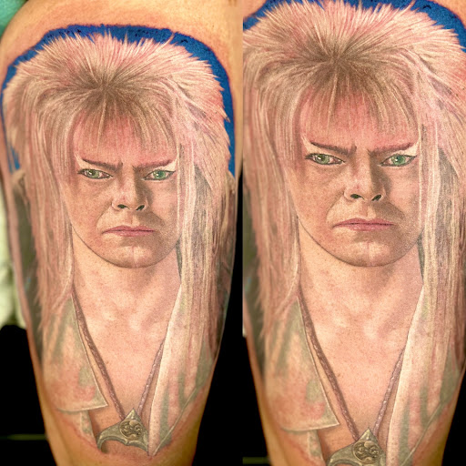 Explore country music tattoos ideas, creative tattoo ideas in Wheeling, available at SPFX Tattoo